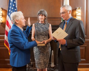 EPA Administrator Gina McCarthy (left) in 2013 as she is sworn in by Deputy Administrator Bob Perciasepe, while former Administrator Carol Browner holds the Bible. 